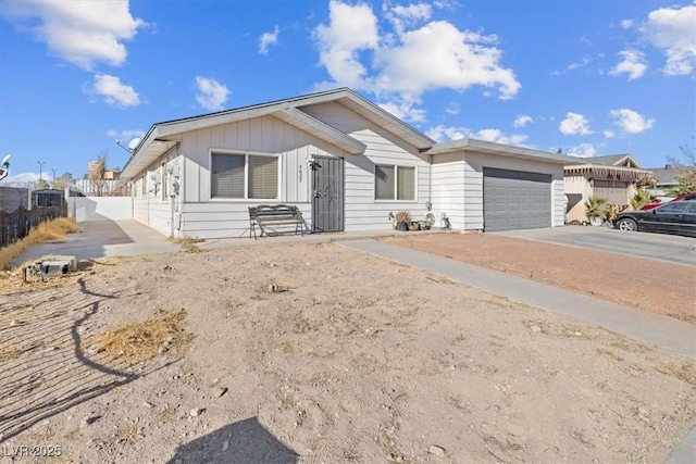 single story home with a garage