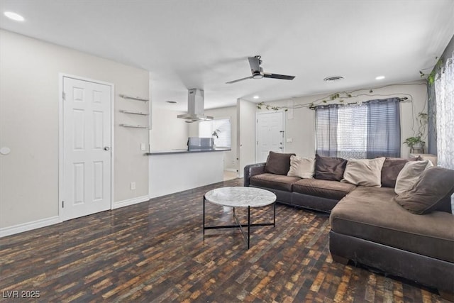 4027 Boratko St, Las Vegas, NV 89115 - living area featuring a ceiling fan, wood finished floors, and recessed lighting
