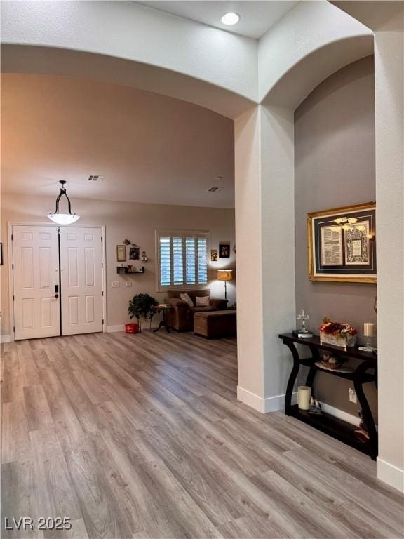 foyer entrance featuring light wood-type flooring