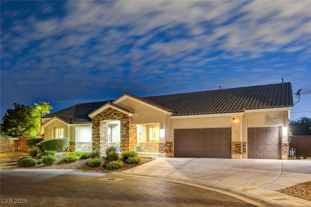 view of front of property with a garage