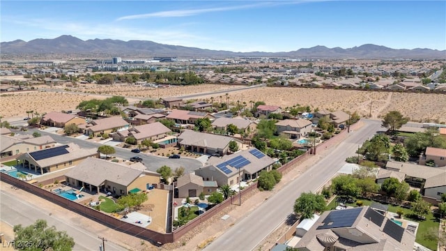 drone / aerial view featuring a mountain view