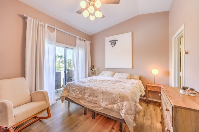 bedroom with access to exterior, light wood-type flooring, vaulted ceiling, and ceiling fan