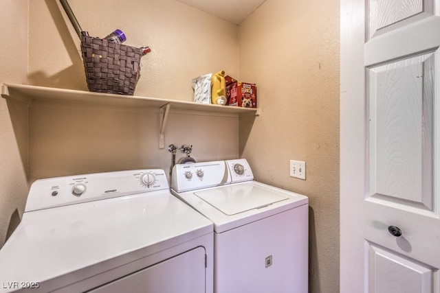 laundry room with washing machine and dryer