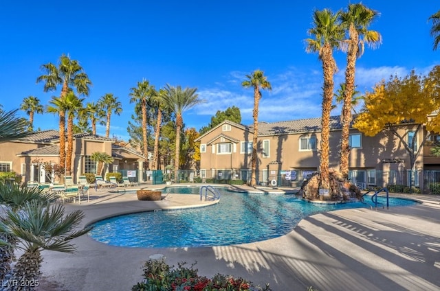 view of swimming pool with a patio area