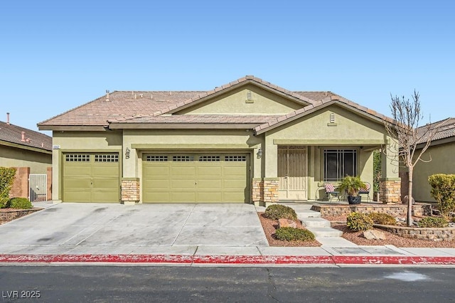 view of front of property with a porch and a garage