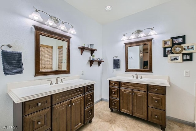 bathroom with vanity and tile patterned floors