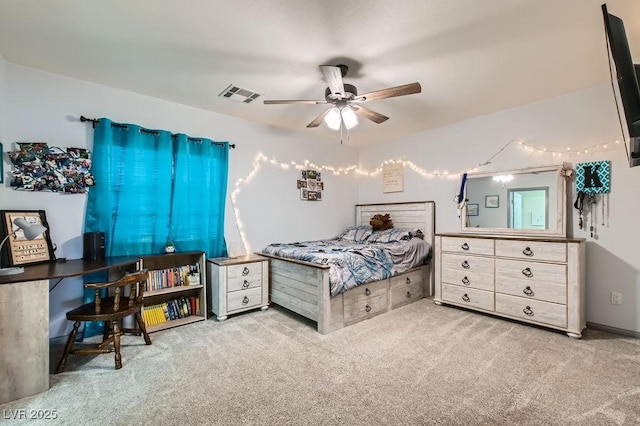 bedroom with light colored carpet and ceiling fan