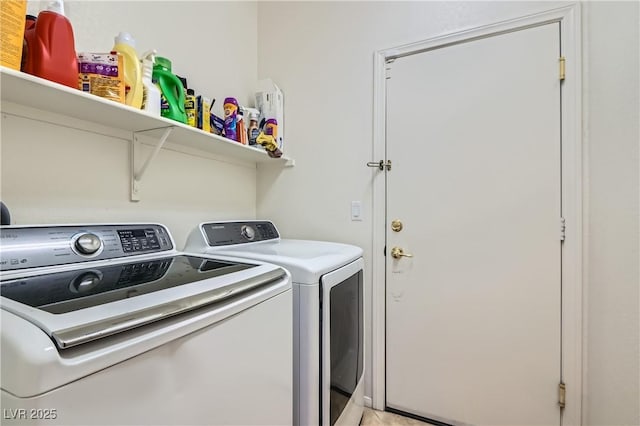 laundry area with laundry area and washing machine and clothes dryer