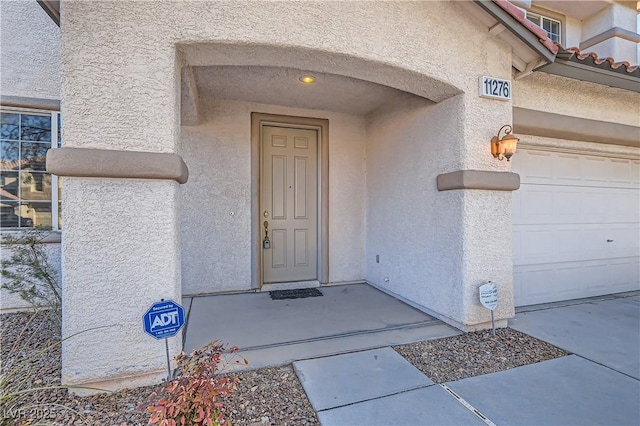 11276 Accademia Ct, Las Vegas, NV 89141 - view of exterior entry featuring stucco siding