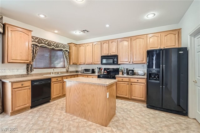 11276 Accademia Ct, Las Vegas, NV 89141 - kitchen featuring black appliances, a sink, light brown cabinets, light countertops, and a kitchen island