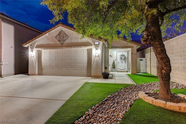 view of front of property featuring a garage