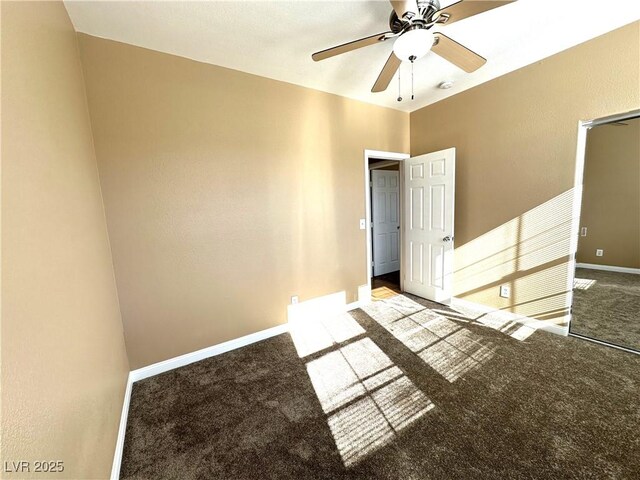 unfurnished room featuring ceiling fan and carpet