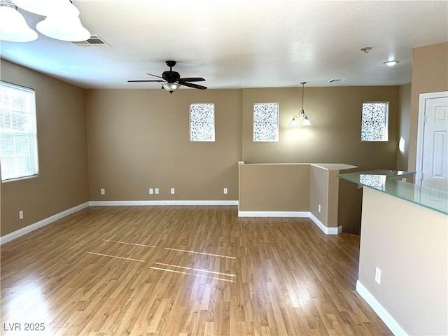 interior space featuring ceiling fan and hardwood / wood-style floors