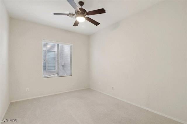 unfurnished room featuring carpet and ceiling fan