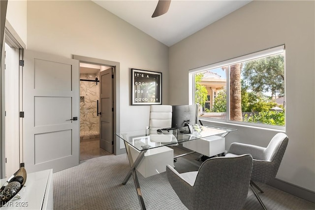 office with carpet, vaulted ceiling, and ceiling fan