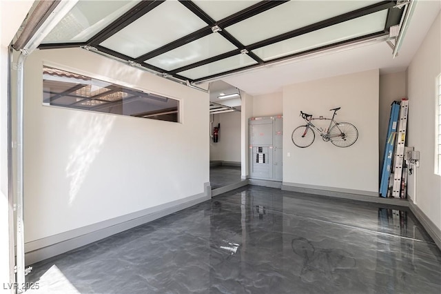 garage featuring baseboards