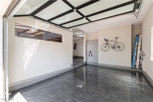 interior space featuring baseboards