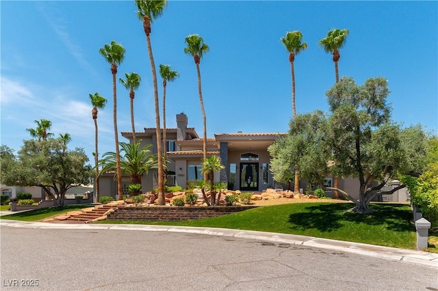 view of front of house with a front yard