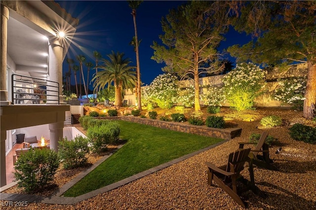 view of yard at night