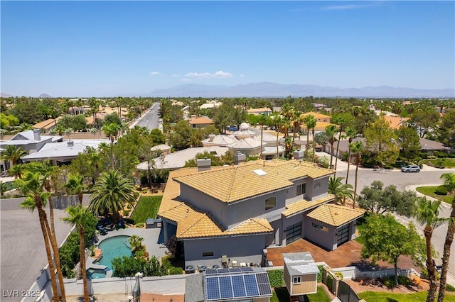 drone / aerial view with a residential view and a mountain view