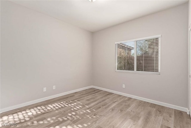 unfurnished room featuring light wood-type flooring