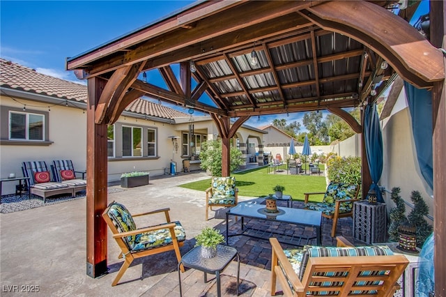 view of patio / terrace with an outdoor living space and a gazebo