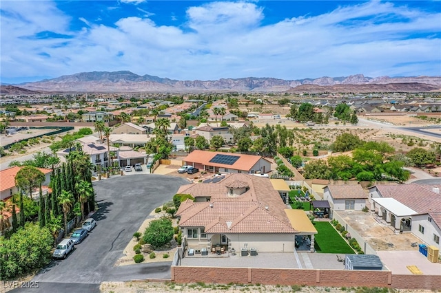 drone / aerial view featuring a mountain view