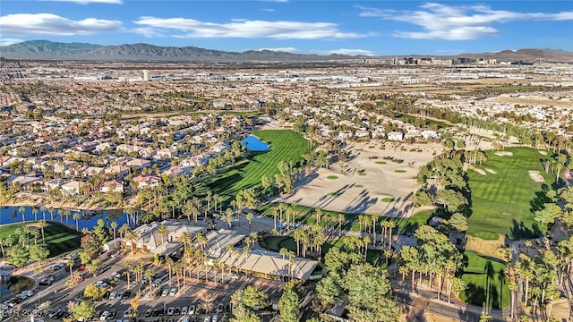 aerial view featuring a water and mountain view