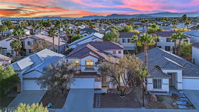 aerial view at dusk with a mountain view