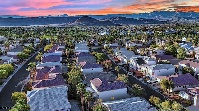 aerial view at dusk with a mountain view