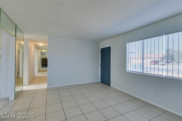 view of tiled spare room