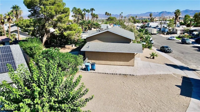 birds eye view of property featuring a mountain view