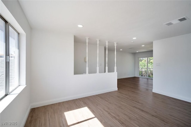 spare room featuring hardwood / wood-style flooring