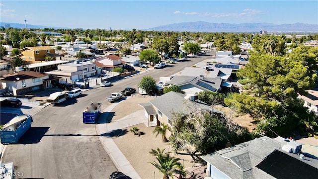 birds eye view of property featuring a mountain view