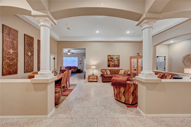 living room with ceiling fan