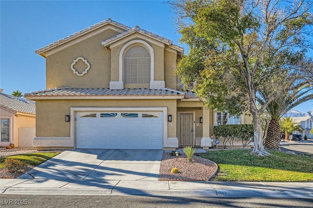 view of front of home with a garage