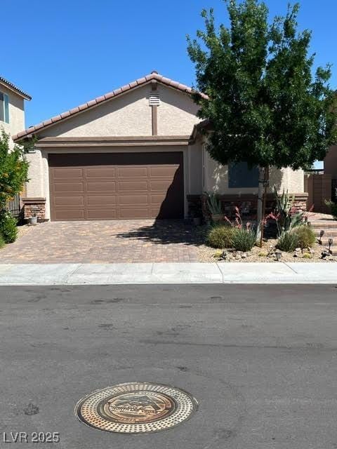 view of front of property featuring a garage