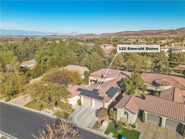 bird's eye view with a mountain view