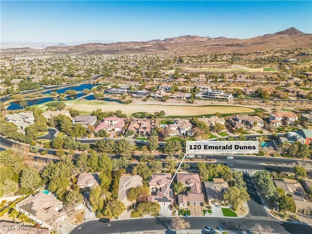 bird's eye view featuring a water and mountain view