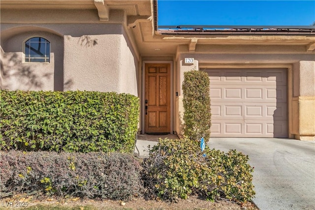 property entrance featuring a garage