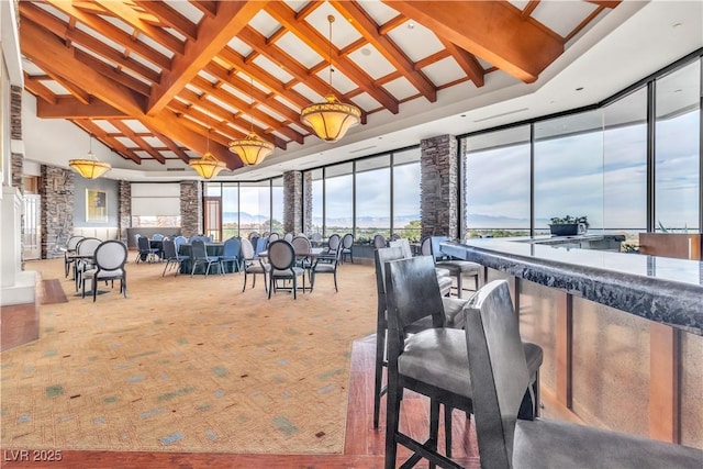 sunroom / solarium with beamed ceiling