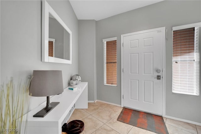 tiled foyer entrance with plenty of natural light