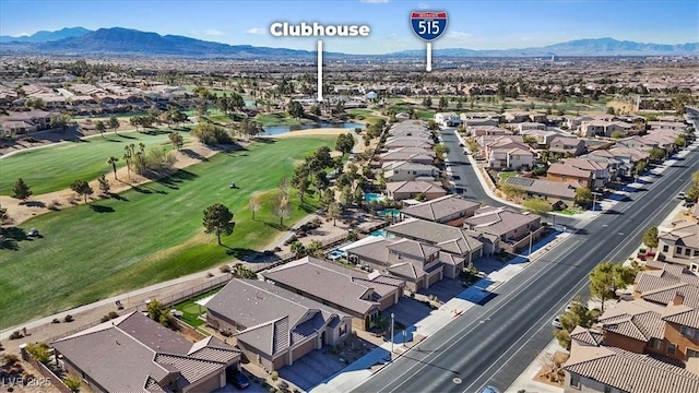 birds eye view of property featuring a mountain view