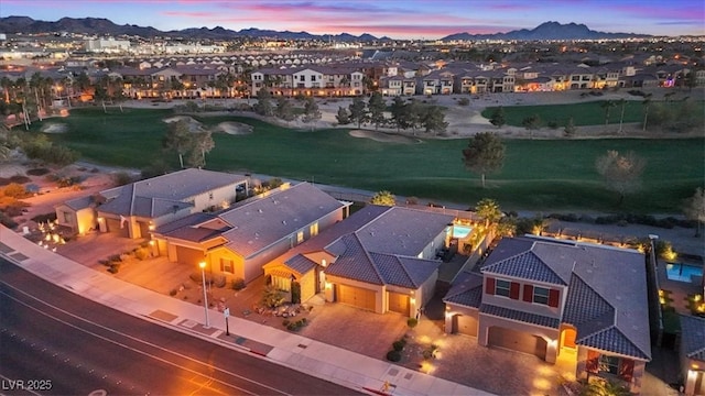 aerial view at dusk with a mountain view