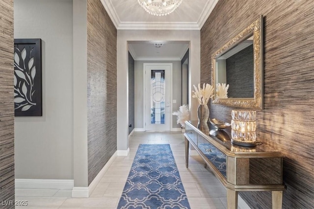 interior space featuring crown molding and a chandelier