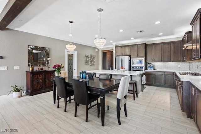 dining room featuring a chandelier