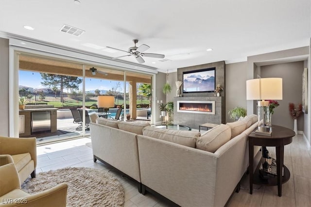 living room featuring ceiling fan