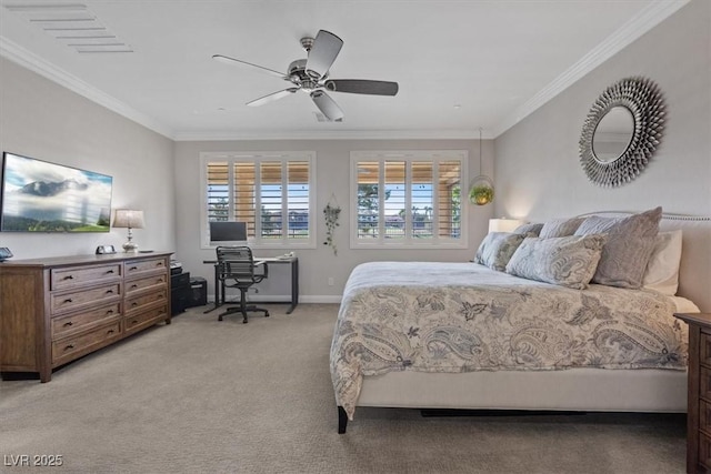 carpeted bedroom featuring ceiling fan and ornamental molding