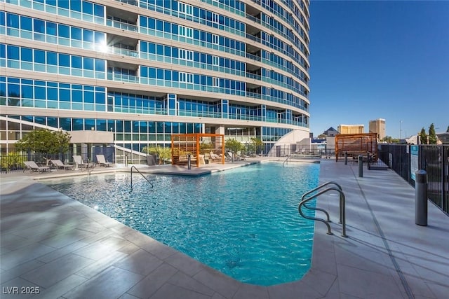 view of pool featuring a patio