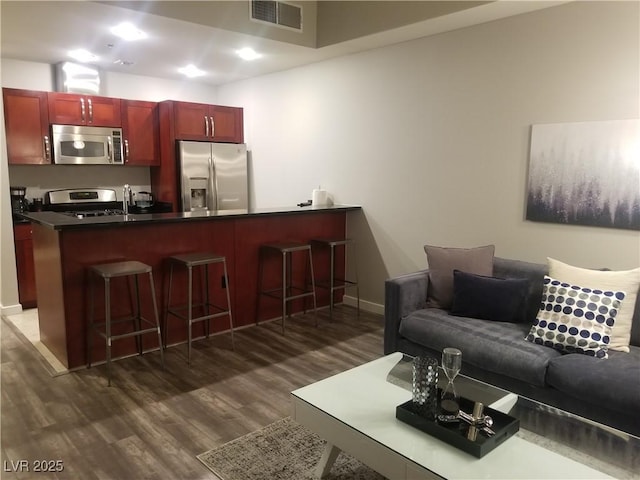 living room with dark wood-type flooring